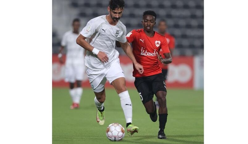 Al Ahli and Al Rayan players in action